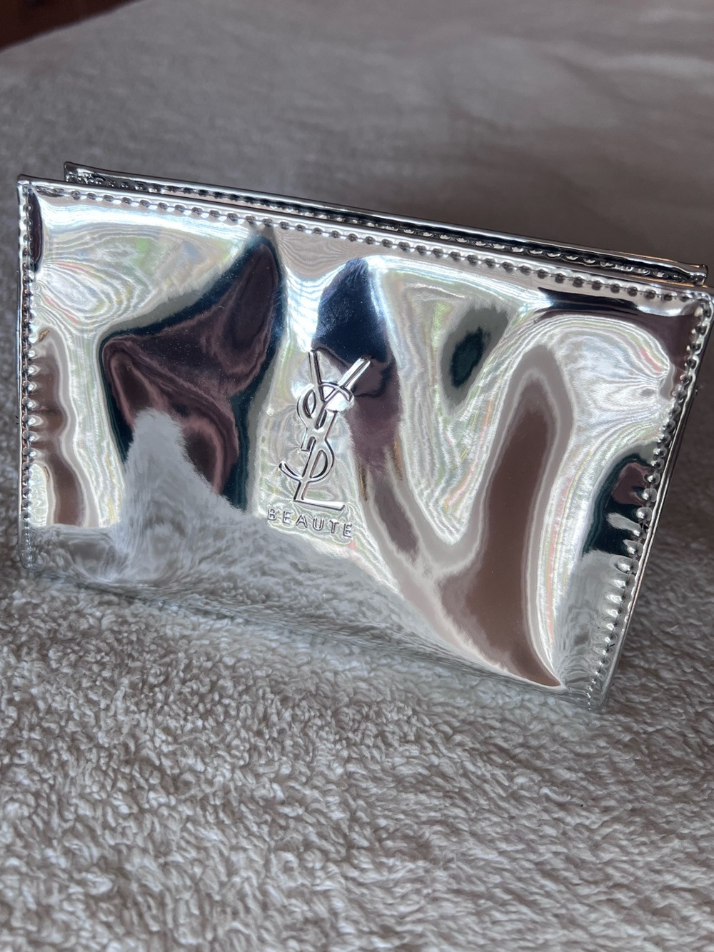 Yves Saint Laurent Silver Reflective Makeup Pouch